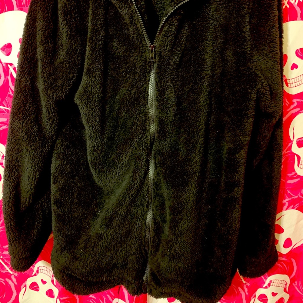 Black fleece jacket (no pockets)